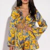 ADMIT IT LONG SLEEVE PRINTED ROMPER WITH CUT OUT