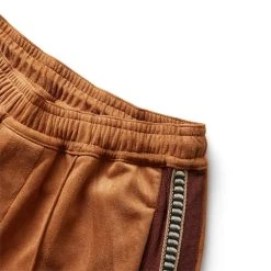 Sasquatchfabrix FAUX SUEDE FLARE SILHOUETTE TRACK PANTS -helmut shop sasquatchfabrixFAUXSUEDEFLARESILHOUETTETRACKPANTSCAMELS22AW PA9 012 01 3