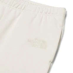 The North Face XX KAWS SWEATPANT -helmut shop thenorthfaceTNFXKAWSSWEATPANTMOONLIGHTIVORYMNF0A7WLK128 3